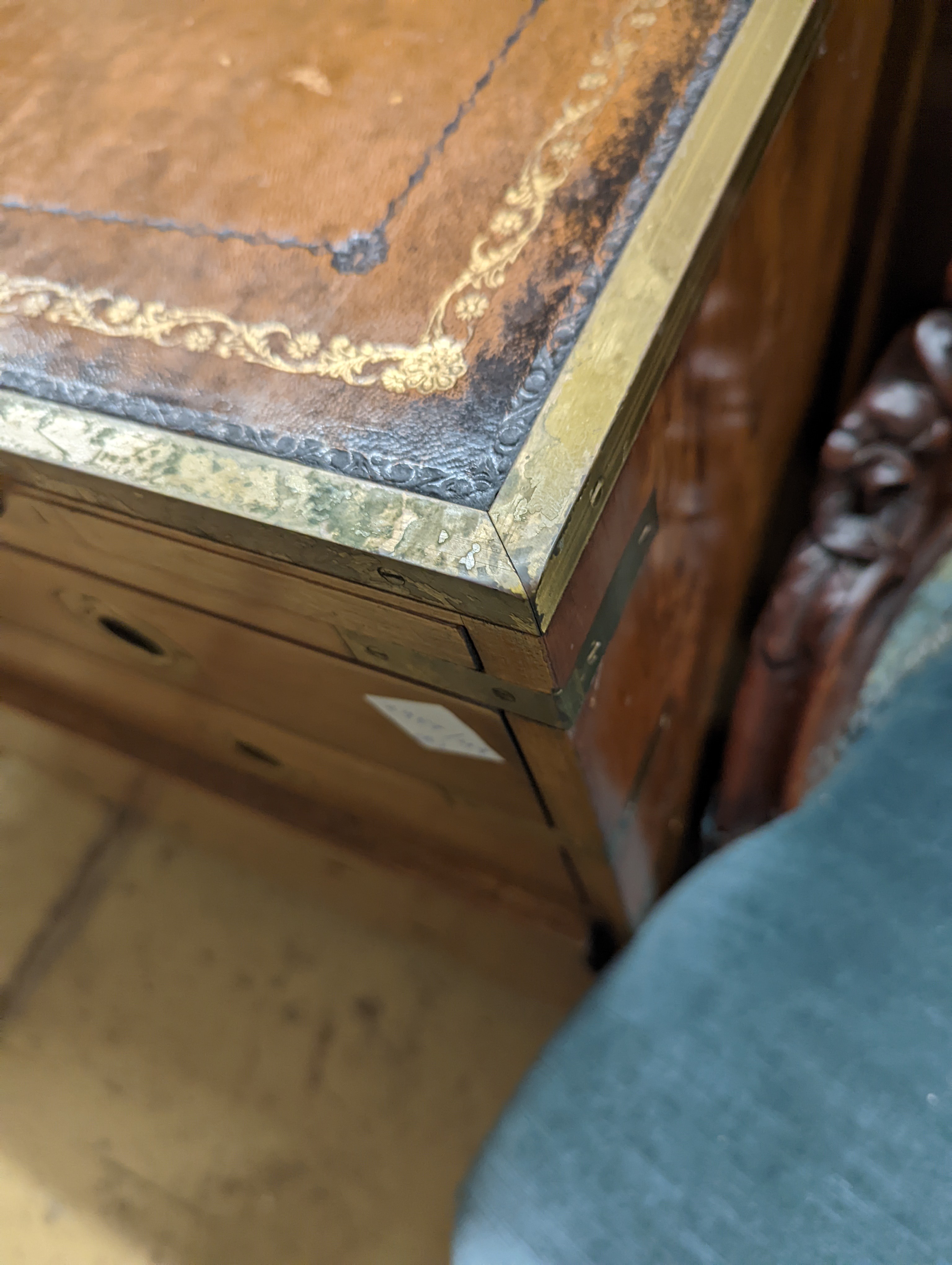 A pair of reproduction brass mounted military style yew veneered bedside chests with leather inset tops, width 56cm, depth 40cm, height 60cm
